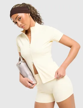 Sculpt Short Sleeve Full Zip Top - Damen, Cremefarben - female - Size: L - DAILYSZN - FashionsVida