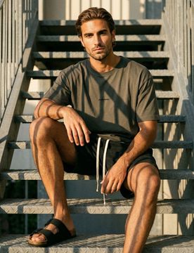 T-shirt in cotone con scritta Studio Design - verde petrolio